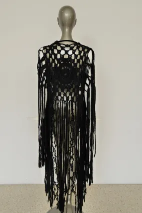 Slashed Bohemian style knit vest by Rodarte