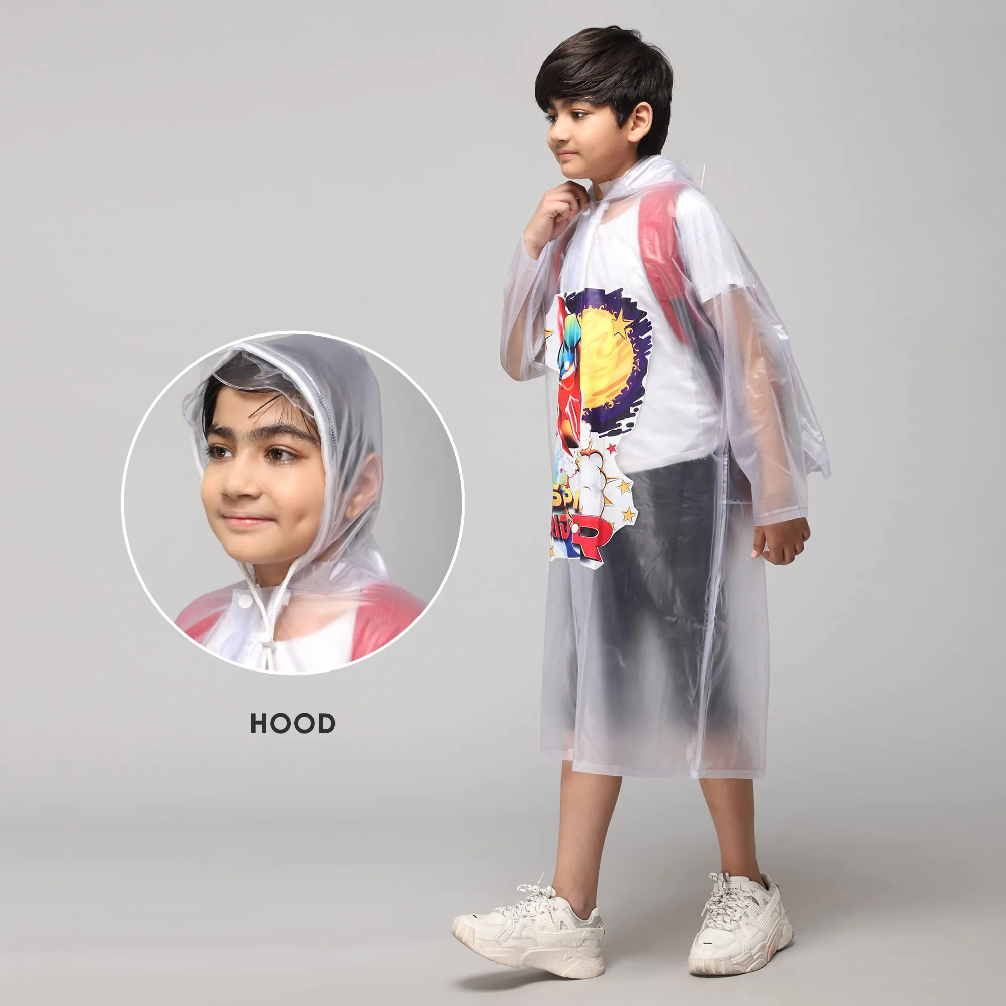 THE CLOWNFISH Men Toon Caper Series Kids Waterproof Pvc Mid-Length Longcoat With Adjustable Hood & Extra Space For Backpack/Schoolbag Holding. Printed Plastic Pouch. Kid Age-5-6 Years (White)